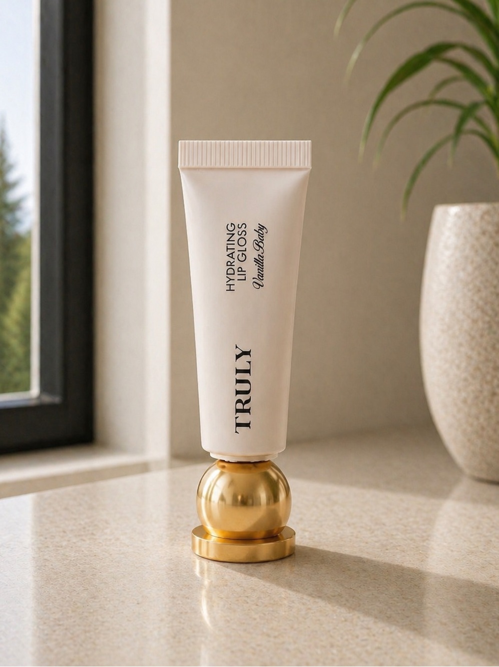 $29 New Truly Hydrating Lip Gloss - Vanilla Baby